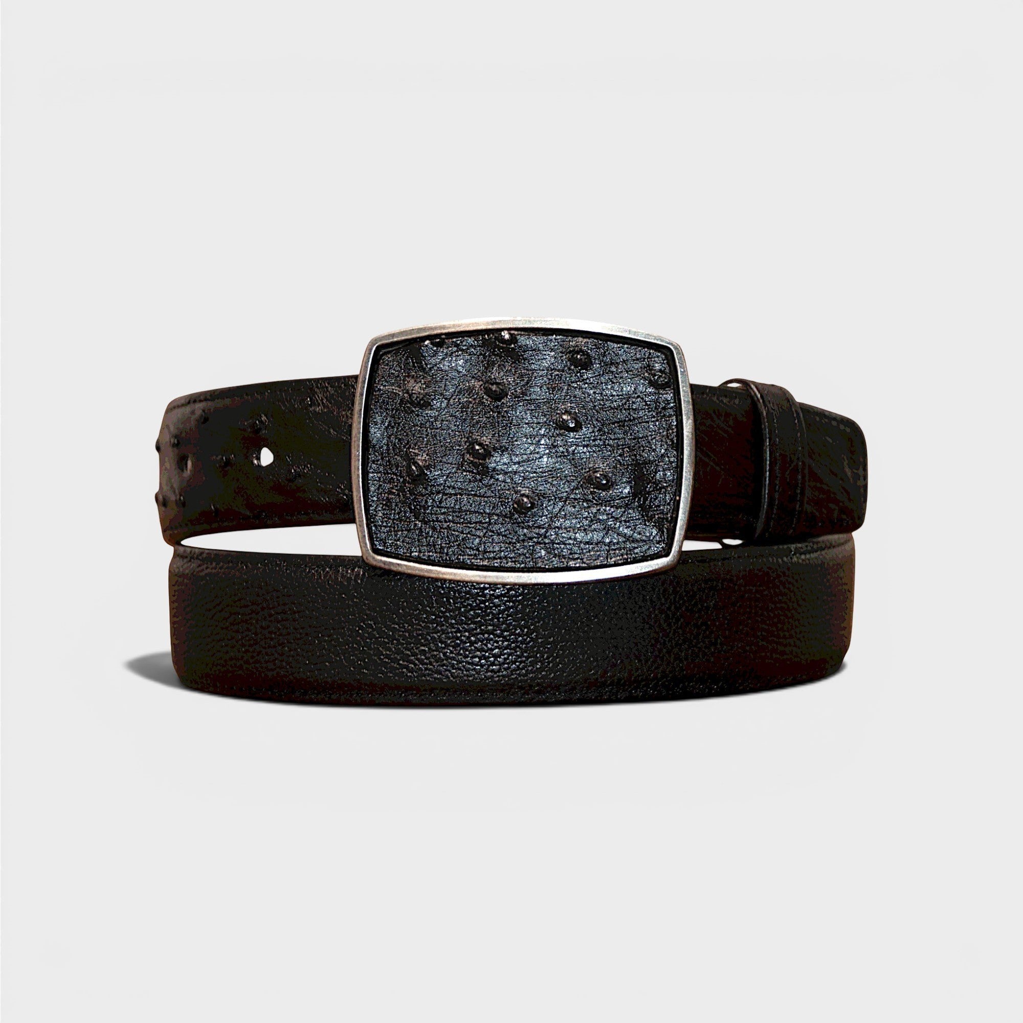 Cinturón VIARCI BELTS de piel negra con textura exótica y hebilla metálica rectangular de diseño elegante