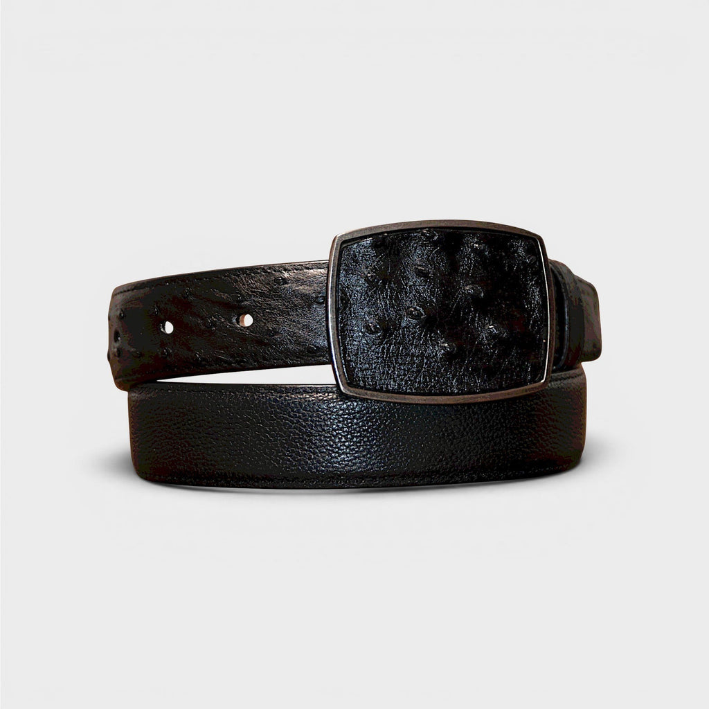 Cinturón de piel negro VIARCI BELTS con textura exótica y hebilla metálica rectangular de diseño elegante.