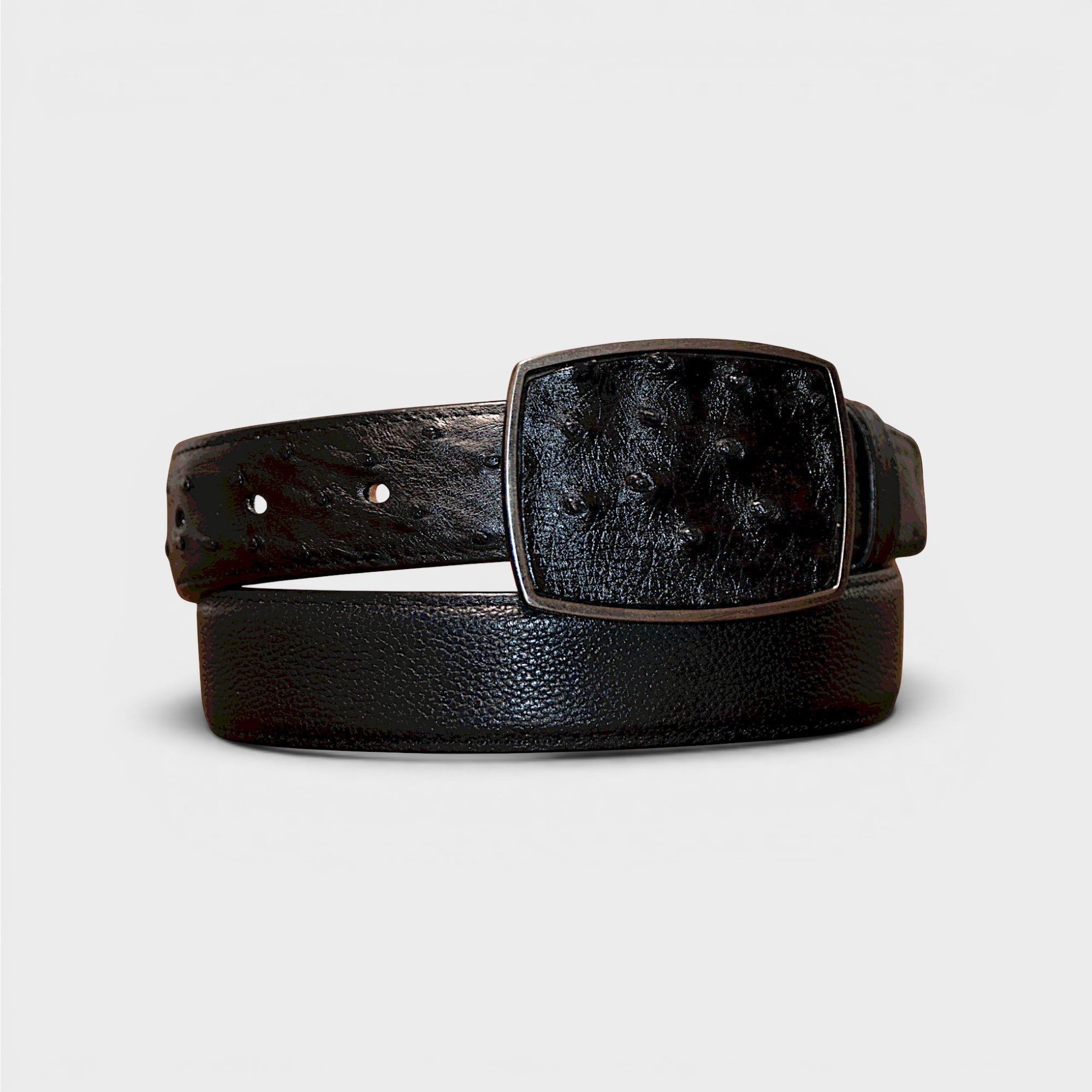 Cinturón de piel negro VIARCI BELTS con textura exótica y hebilla metálica rectangular de diseño elegante.