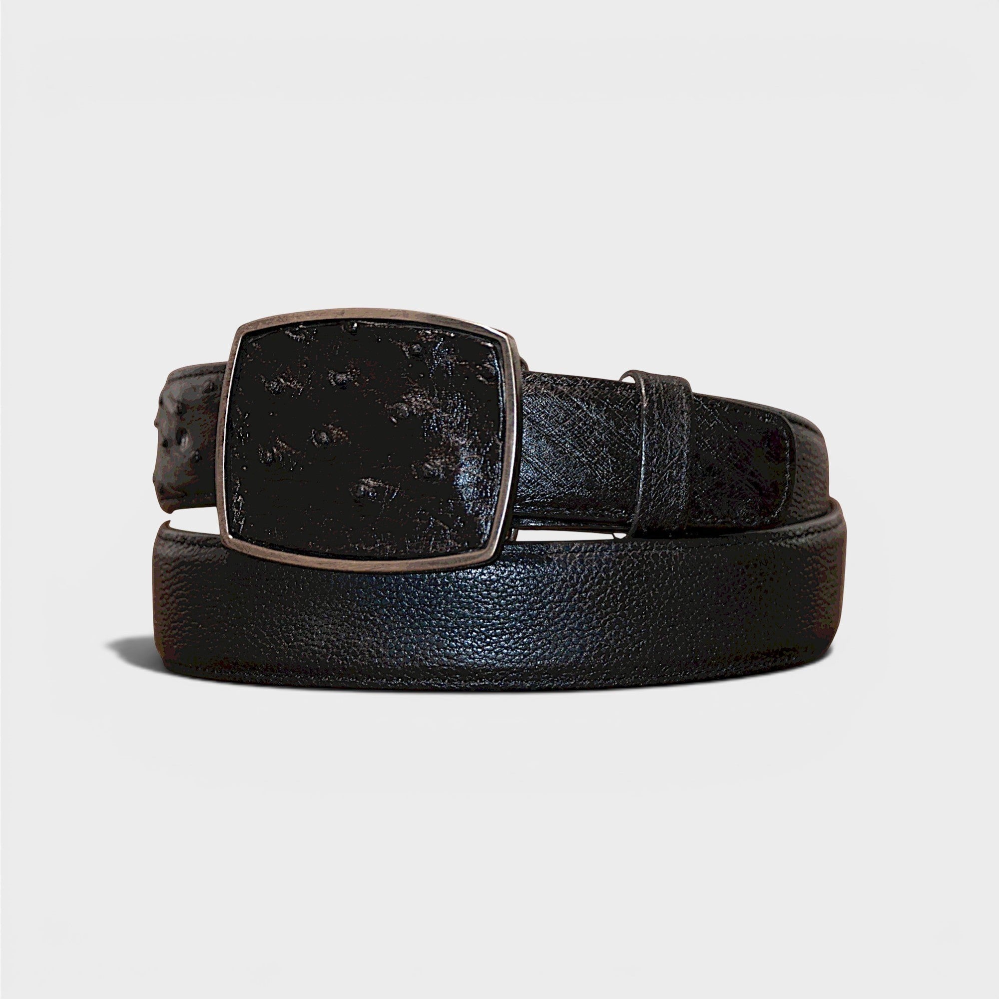 Cinturón de piel negro VIARCI BELTS con hebilla metálica texturizada, diseño elegante y sofisticado para caballero.